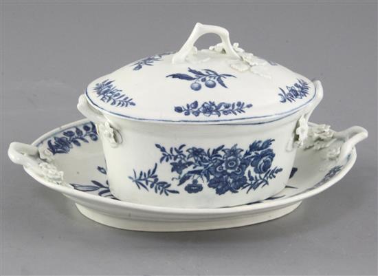 A Worcester rose-centred spray group blue and white butter tub, cover and stand, c.1770, cross hatch crescent mark, 21cm